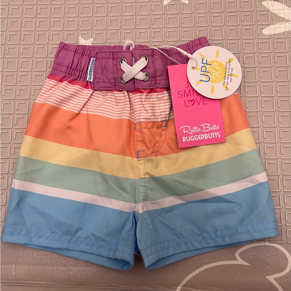 Ruffle Butts Colorful Striped Swim Shorts for kids